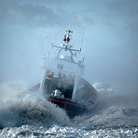 Coast Guard ship during storm in ocean