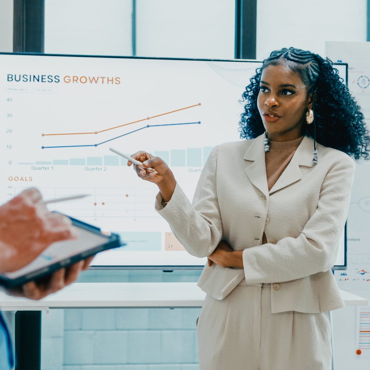 Diverse finance team business meeting leader presenting investment strategy and budget planning at office. Marketing strategy analysis, stock market trading, financial consultant concept.