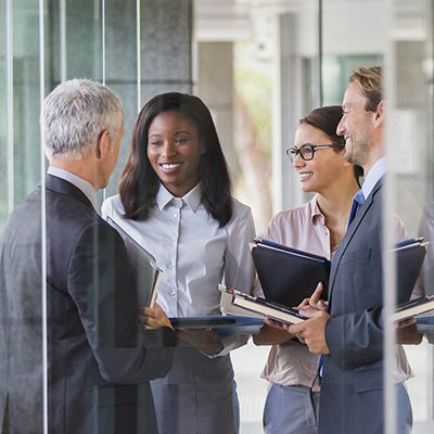 Business people talking in office building